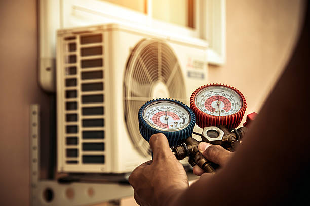Professional Heat Pump Repair technician working in Midway City, CA
